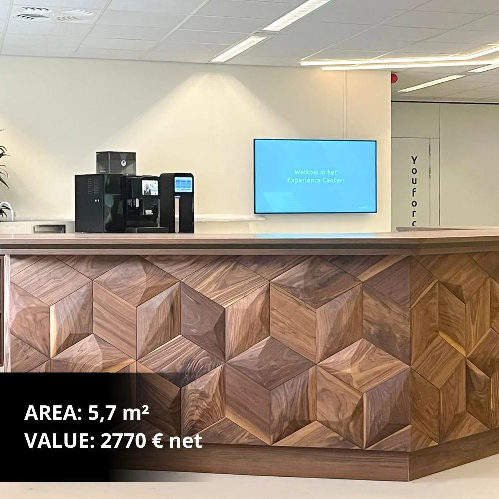 Modern living room with geometric wooden wall panel as a decorative feature behind a dining table.